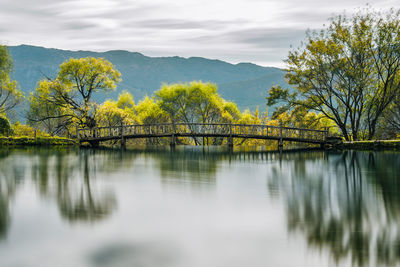 Bridge over river against sky