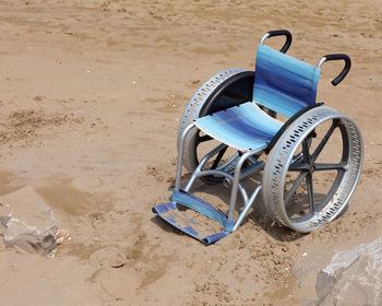 High angle view of toy on sand