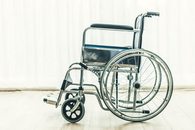 Bicycle wheel against wall