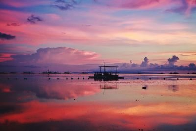 Scenic view of sea against sky at sunset