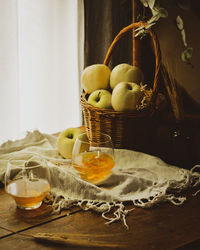 Fruits in basket on table