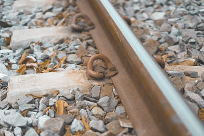 High angle view of stones on railroad track