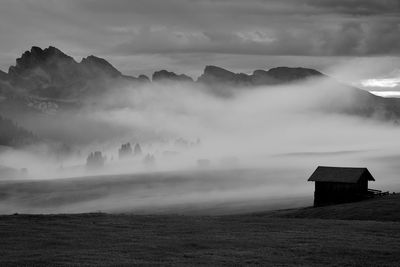 Scenic view of fog over landscape