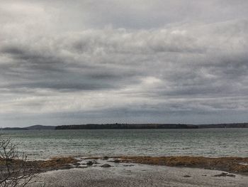 Scenic view of sea and cloudy sky