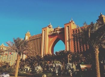 Low angle view of building against blue sky