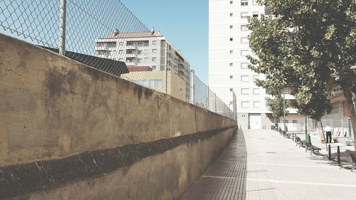 Narrow walkway along buildings