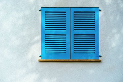 Close-up of window on wall of building