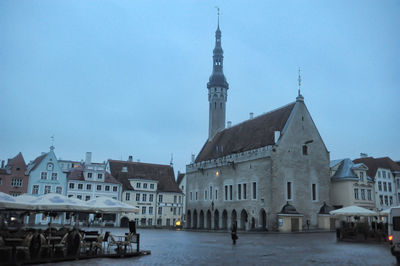 View of buildings in city against sky