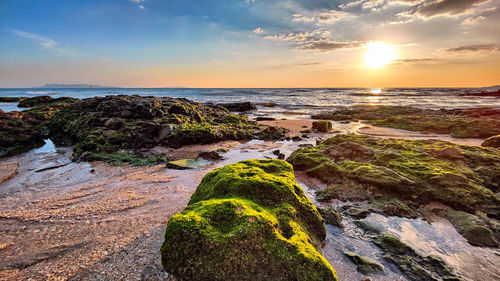 Scenic view of sea against sky during sunset