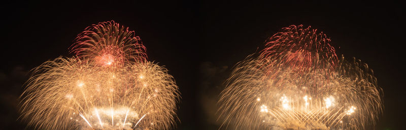 Firework display at night