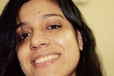 Close-up portrait of smiling woman