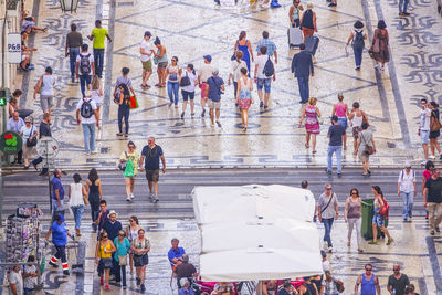 High angle view of people walking in rain