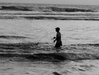 Man surfing in sea