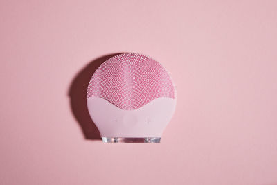 Close-up of toy against pink background
