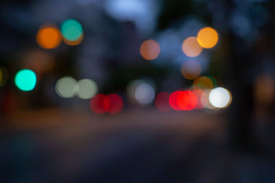 Defocused image of illuminated lights at night