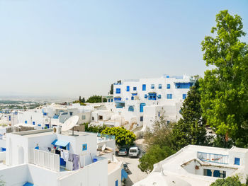 Traditional white and blue houses in sidi bou said. cityscape in sunny day. tunisia.