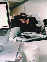 Woman photographing through smart phone