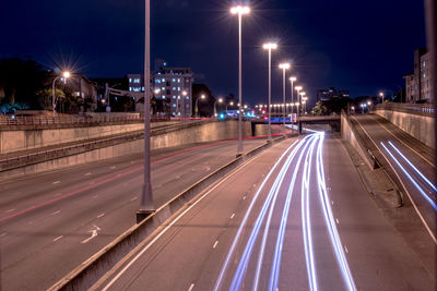 Light trails on city street at night