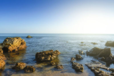 Scenic view of sea against clear sky