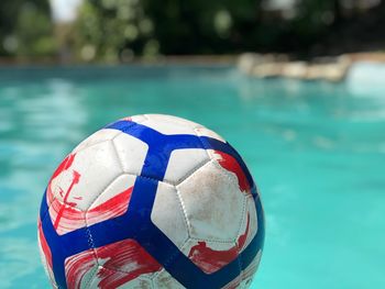 Close-up of blue ball on swimming pool