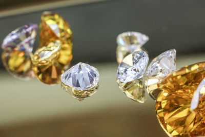 Close-up of diamonds on table