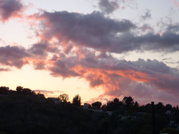 Scenic view of landscape against cloudy sky