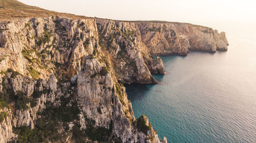 Drone shot of the rugged coastline of sardinia,