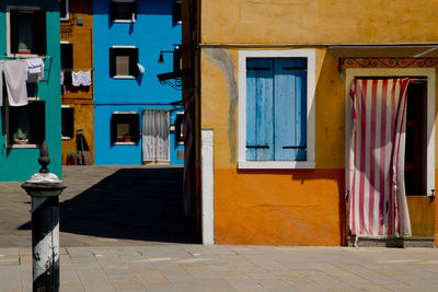 Alley amidst buildings in city