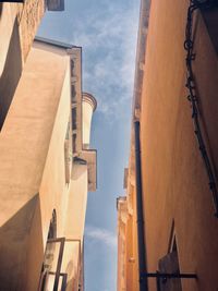 Low angle view of buildings against sky in venice, italy