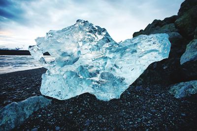 Scenic view of frozen sea against sky