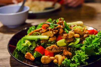 Close-up of salad served in plate on table