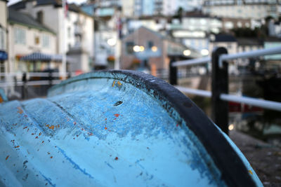 Close-up of upside down boat at harbor