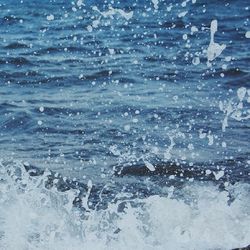 Waves splashing in sea