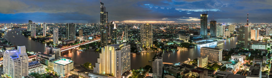 High angle view of modern buildings in city against sky