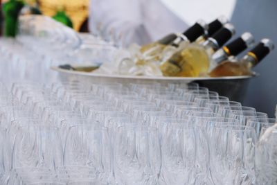 Close-up of glasses and drinks  on table