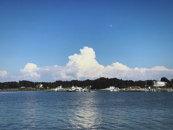 Scenic view of lake against blue sky