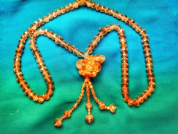 High angle view of heart shape on blue background