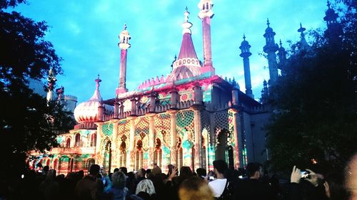 Low angle view of illuminated cathedral against sky