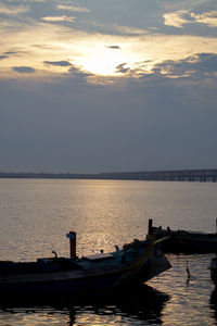 Scenic view of calm sea at sunset