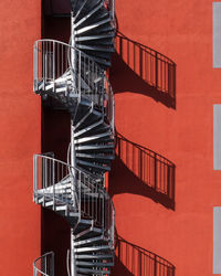 Close-up of spiral staircase against building