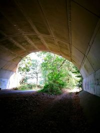 View of bridge through tunnel