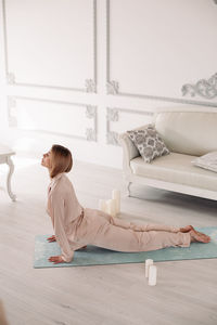 Woman doing yoga at home