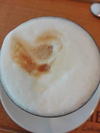 High angle view of cappuccino on table