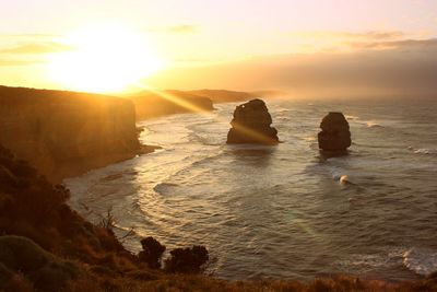 Scenic view of sea against sky during sunset