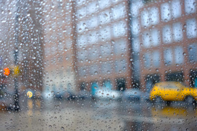 Full frame shot of wet window in rainy season