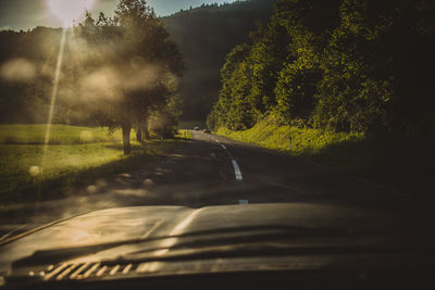 Road seen through car windshield