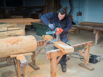 Carpenter working at workshop