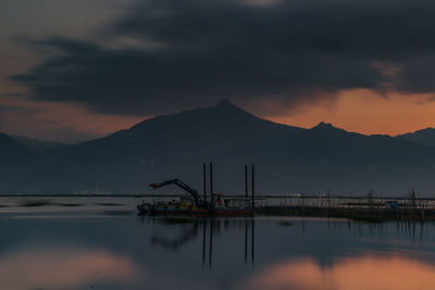 Scenic view of sea against sky at sunset