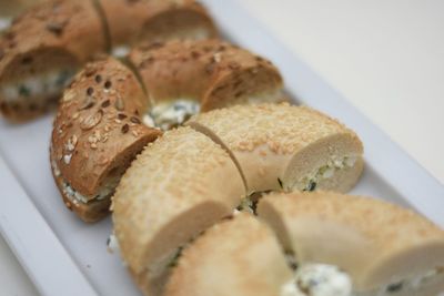 High angle view of bagels served in plate on table