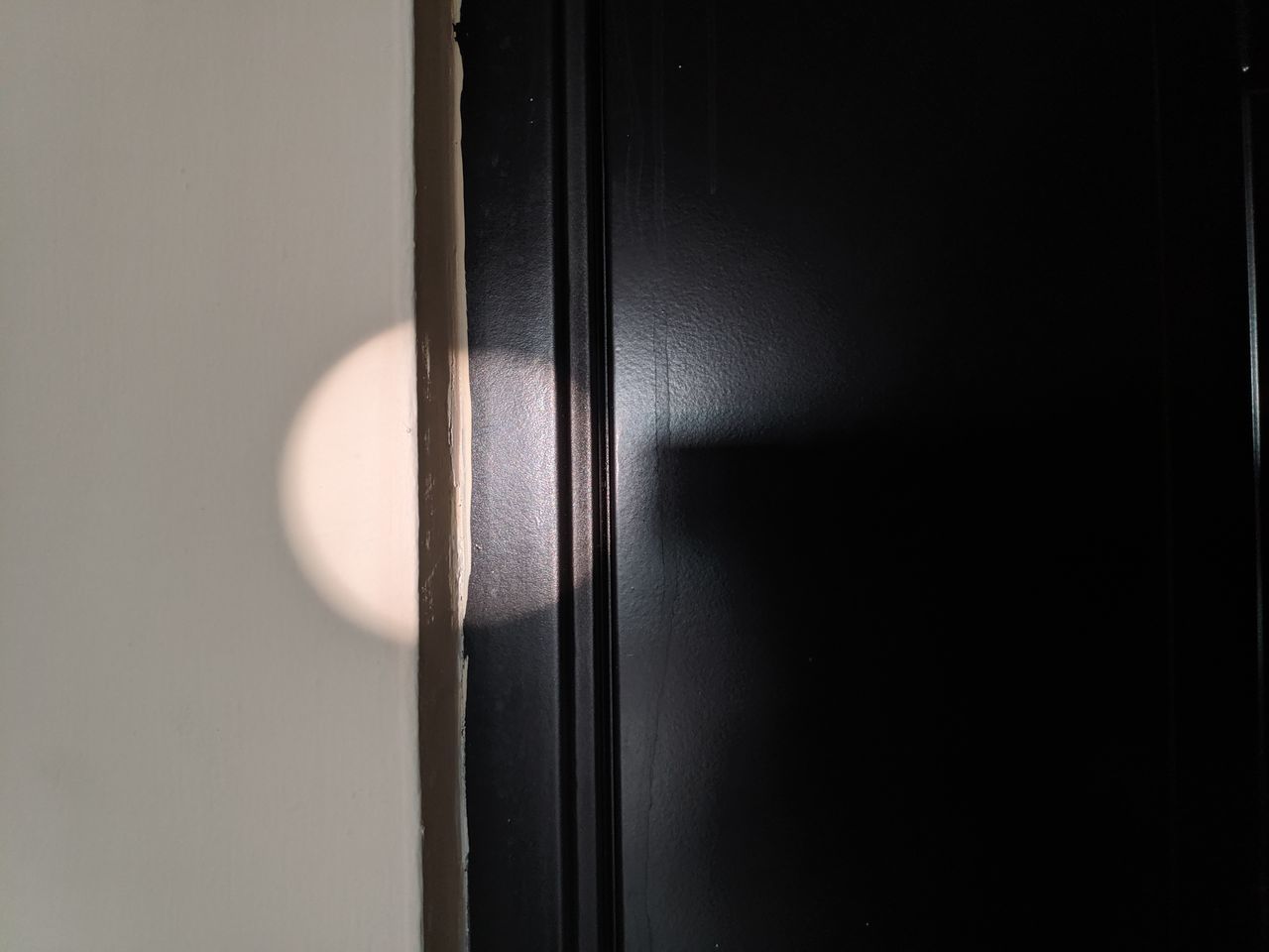 CLOSE-UP OF CLOSED DOOR OF BUILDING